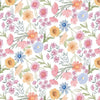 A watercolour floral print of pink, coral, and blue flowers with green stems and leaves, on a white background. 100% cotton quilting fabric from Monkland Quilt Studio